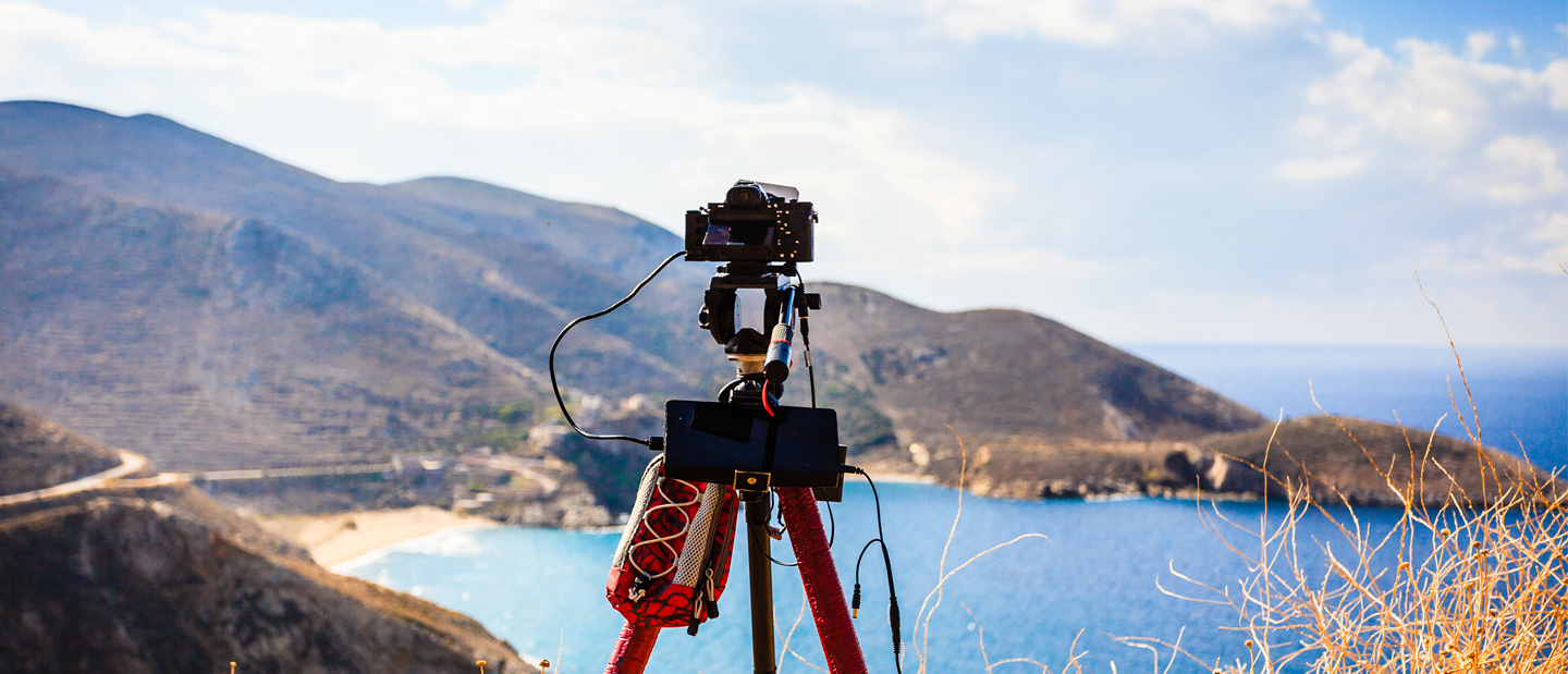 Video camera shooting sunset