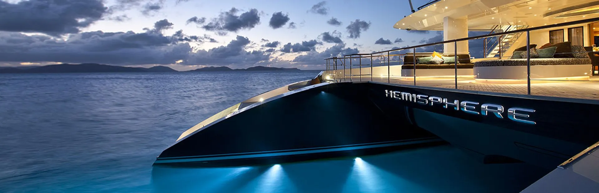 Catamaran yacht Hemisphere at night